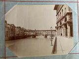 an old photo of a bridge over a river
