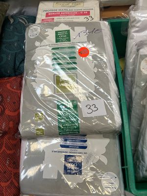 many different types of bedding on display in a store