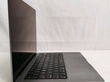 an open laptop computer sitting on top of a white table