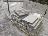 a pallet full of concrete blocks on a pallet
