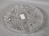 a clear glass bowl with a label on it