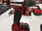 a cordless drill that is sitting on a table