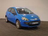 a blue car that is parked in a room