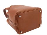 brown leather bag on white background with clippings on the side