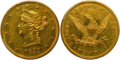 a gold coin with the head of a woman and eagle on it