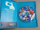 nintendo wii game in a blue case with a wii logo on it