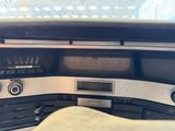 a radio in the center of a car with a remote control
