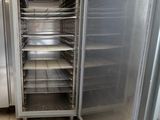 an image of a commercial kitchen with stainless steel appliances