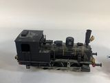 a toy train that is sitting on a white surface