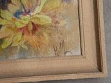 a picture of a painting of a yellow flower in a picture frame