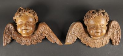 pair of carved wood cherenshes with angel wings