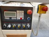 a machine that is sitting on a table in a room
