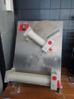 a machine that is sitting on top of a wooden table