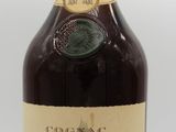an image of a bottle of liquor sitting on top of a table