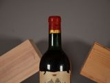 a bottle of wine that is sitting on a table