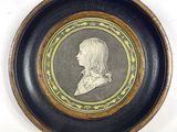 a picture of a picture of a woman in a black and gold frame