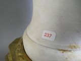 a close up of a white vase with a number on it