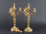 pair of antique brass candelabs with candlesticks and corks