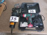 une photo d'une perceuse filaire dans son étui