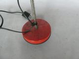 a red light that is on top of a table