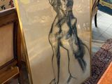 une photo représentant un dessin d'un chien posé sur une table