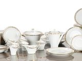 a table with a lot of plates and cups on it