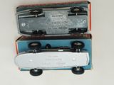 two skateboards that are sitting on top of each other