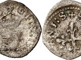 a silver coin with an image of a horse on it