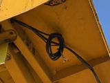 a close up view of a yellow construction vehicle