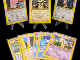 five pokemon cards are shown in a row on a black background