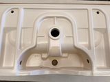 a picture of a sink in a box on a table
