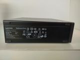 a close up of a dvd player sitting on a table