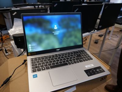 a laptop that is sitting on a table in a room