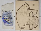 le dessin d'un oiseau sur une feuille de papier, à côté d'un autre dessin représentant un oiseau