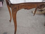 a table that has a marble top on it
