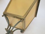 an image of a small metal box with a glass top