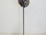 an image of a lamp that is on a stand in a room