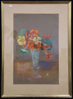 painting of orange and yellow flowers in a glass vase on a table