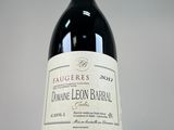 a bottle of wine that is sitting on a table