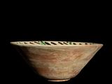 an image of a close up of a bowl on a black background