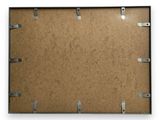 an image of a brown cardboard board with metal clips on it
