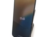 an image of a cell phone is sitting on top of a stand