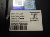 a label on the back of a laptop that says intel core i5