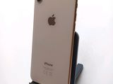 a close up of a cell phone on a stand