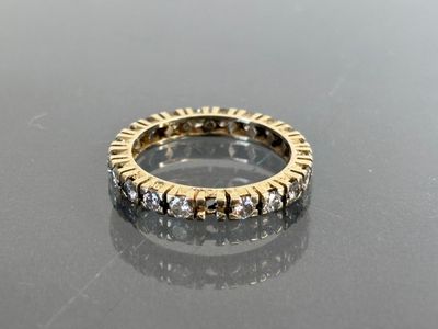 an image of a diamond ring on a table
