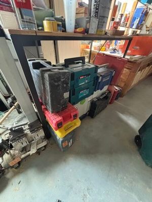 a lot of boxes that are stacked up on a shelf