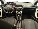 the interior of a small car with a steering wheel and dashboard