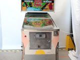 a pinball machine that is sitting in a room