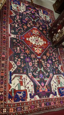 an oriental rug on the floor in a room