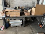 many boxes on the table in the garage